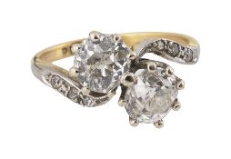 A diamond two stone cross-over ring