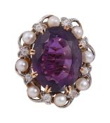 An amethyst, pearl and diamond ring