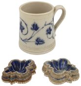 A pair of Doulton Lambeth stoneware table salts