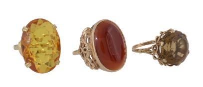 A group of three dress rings