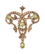 An Edwardian peridot and half pearl pendant/brooch