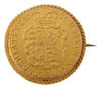 A George III Guinea brooch, dated 1786