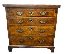 A George I style figured walnut and burr walnut bachelors chest of drawers