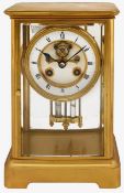 A late 19th century French four glass gilt brass mantle clock