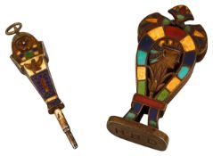 An Egyptian Revival silver-gilt propelling pencil and a brass and enamel desk seal