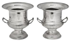 A pair of early 20th century silver plated on copper wine coolers