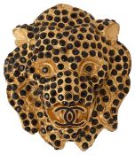 A lion's head brooch by Chanel