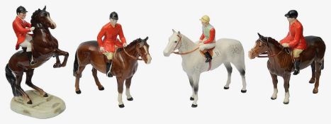 A Beswick Jockey and three huntsmen (4)