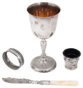 An Elizabeth II silver goblet and other silver