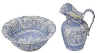 A mid 19th century Staffordshire blue and white transfer wash jug and basin