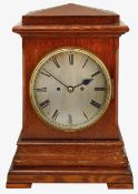 A late Victorian oak cased bracket clock