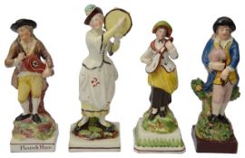 Four early 19th century Staffordshire pearlware figures of musicians
