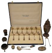 An Elizabeth II silver sugar cased and other silver
