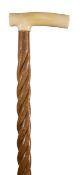 A late 19th century scrimshaw handled walking stick