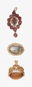 A 19th flat cut garnet, seed pearl pendant and a fob
