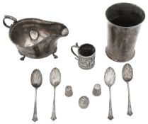 An Edwardian silver beaker and other silver