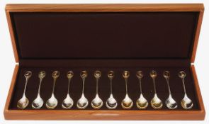 An Elizabeth II cased set of twelve silver RSPB Bird spoons