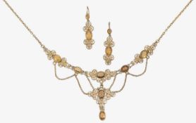 An Arts & Crafts silver gilt festoon necklace and earrings