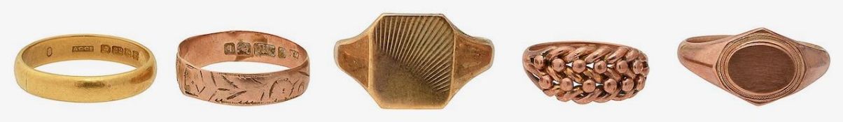 A collection of assorted gold rings