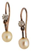 A pair of pearl and diamond ear pendants