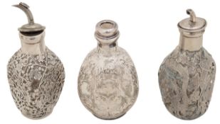 Three early 20th century silver overlaid miniature dimple bottles