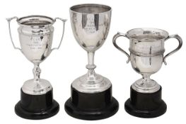 Three silver trophies