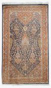 A Persian Kashan silk prayer rug