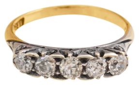 A late Victorian five stone diamond ring