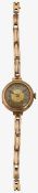 A 9ct gold manual wind lady's bracelet wristwatch