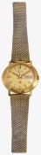 A gentleman's Bulova Accuquartz Day-Date 9ct gold wristwatch