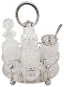 A late Victorian silver four bottle cruet set