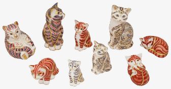 Nine Royal Crown Derby cat paperweights