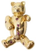 A gold and gem-set teddy bear pin by Jacques Lacloche