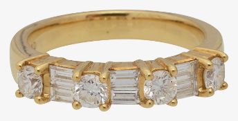 A diamond set half eternity ring