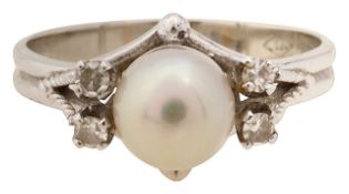 A cultured pearl and diamond ring