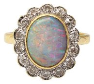 An opal and diamond cluster ring