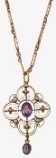 An Edwardian amethyst and half pearl pendant on chain