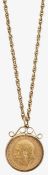 A half sovereign pendant