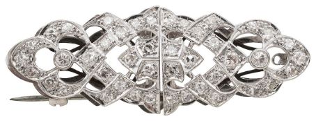 A diamond brooch/dress clip
