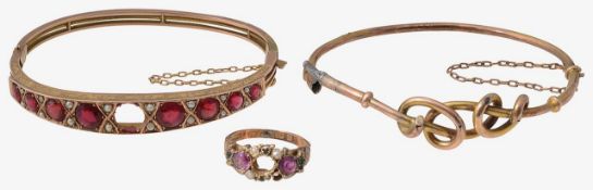 A group of jewellery including two bangles
