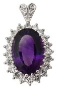 An amethyst and diamond cluster pendant