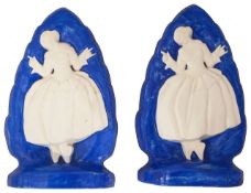 Two Ashtead Potters 'Girl Skipping' advertising plaques