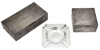 Two silver prize table cigarette boxes and an ashtray