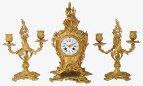 A late 19th century French Louis XV Rococo style gilt bronze clock garniture
