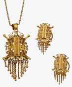A wire-work gold necklace and matching earrings