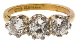 A diamond three stone diamond ring