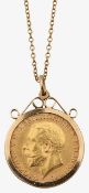A half sovereign pendant