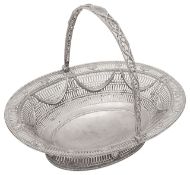 A George III Neoclassical silver cake basket