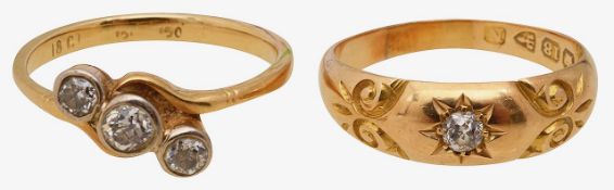 Two diamond set rings