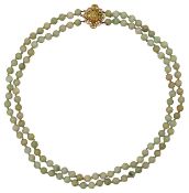 A double strand of jade beads